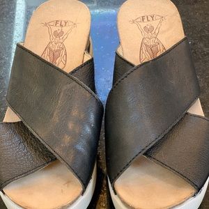 Fly London black wedge sandals.